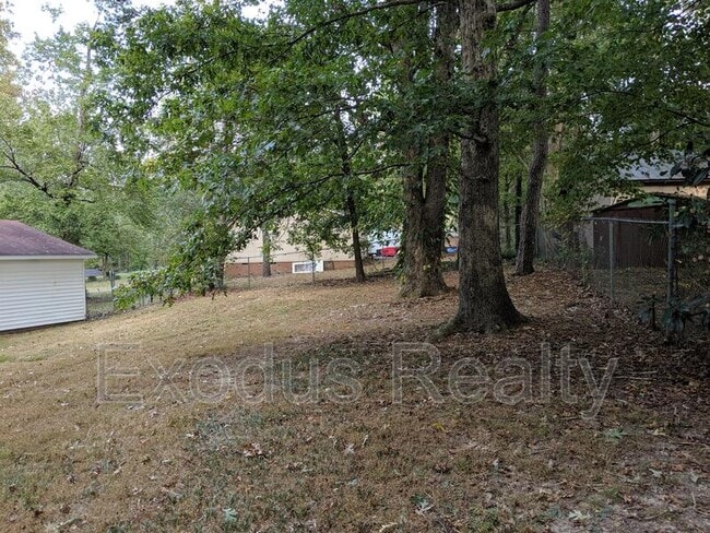 Building Photo - 8708 Peach Tree Dr