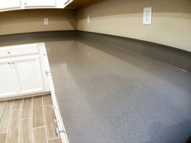 Building Photo - Your Private Escape with High-End Finishes...