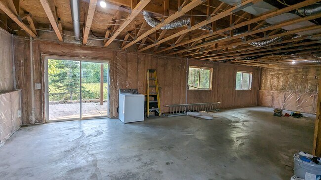 Huge open basement with walkout to the stamped, concrete patio. - 758 Park Brook Rd NW