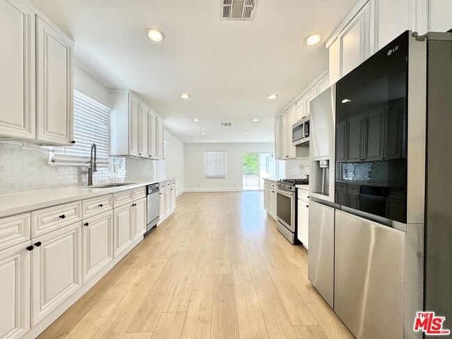 Building Photo - 5937 Ranchito Ave