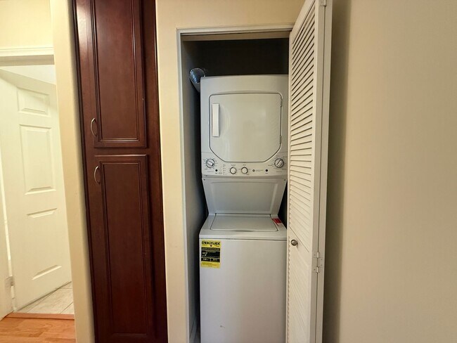 Building Photo - Upgraded Condo with Private Patio, AC, Pool, Gym, and Covered Parking in Gated Community