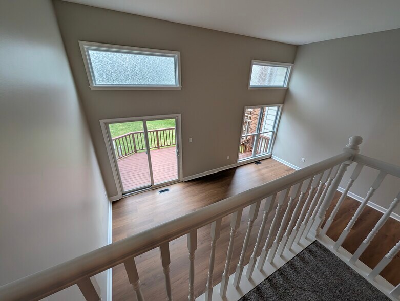 Landing at Living Room - 14141 Betsy Ross Ln