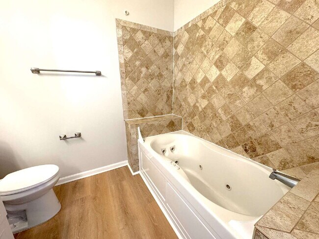 Building Photo - Inviting Suburban Retreat with Spacious Layout and Timeless Hardwood Flooring