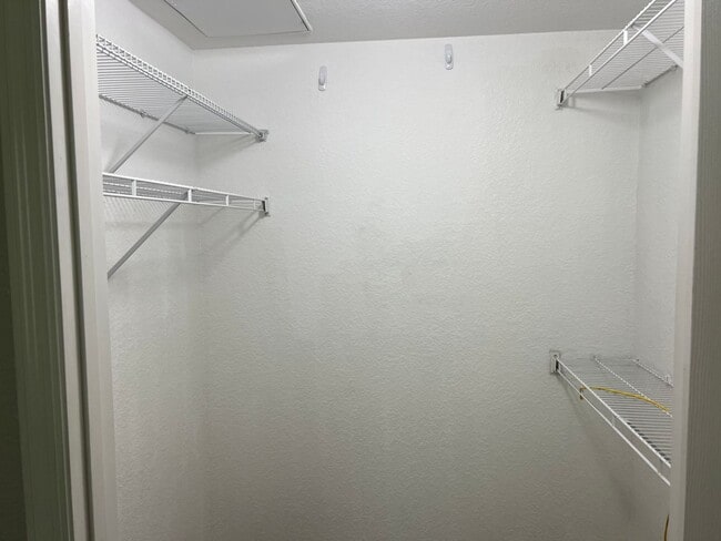 Building Photo - Spacious 3BR/2BA Gated Condo with Resort-Style Amenities!