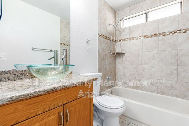 Building Photo - 5704 E Aire Libre Ave