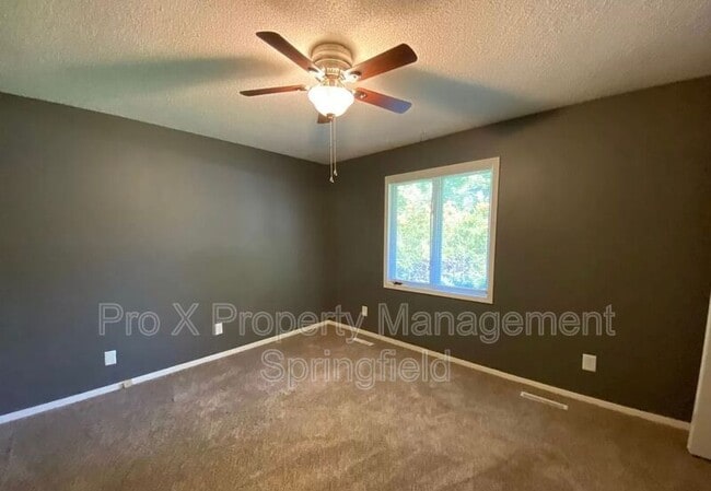 Building Photo - 5615 S Farm Rd 163