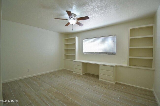 Building Photo - 5570 W Becker Ln