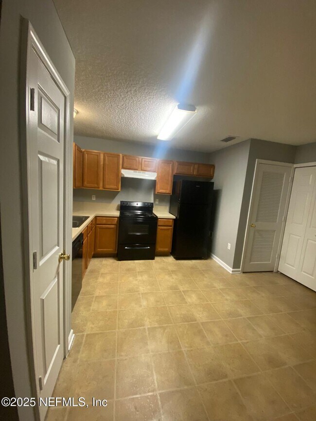 Building Photo - 8465 McGirts Village Ln