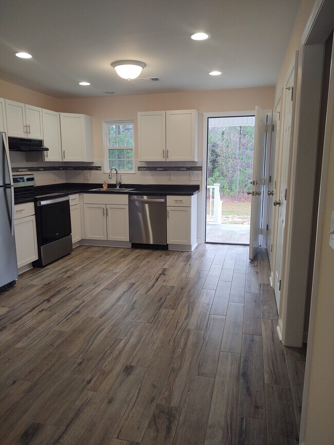 Dining room-kitchen - 230 E Meadowlake Pky