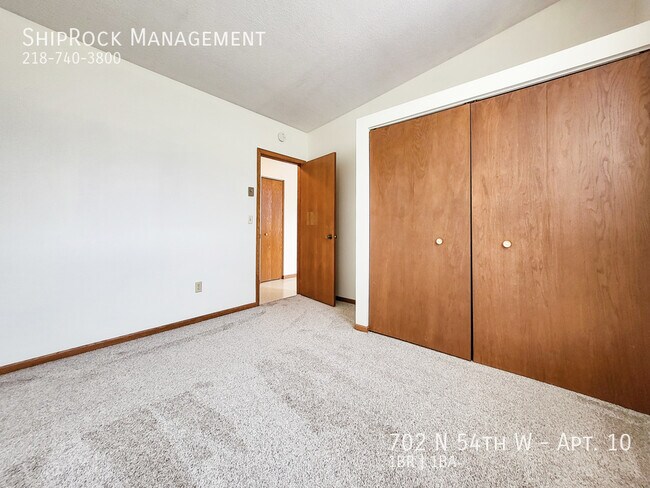 Building Photo - 702 N 54th Ave W