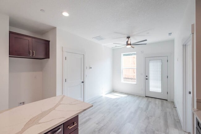 Building Photo - NEW CONSTRUCTION 1BD W/GARAGE & YARD