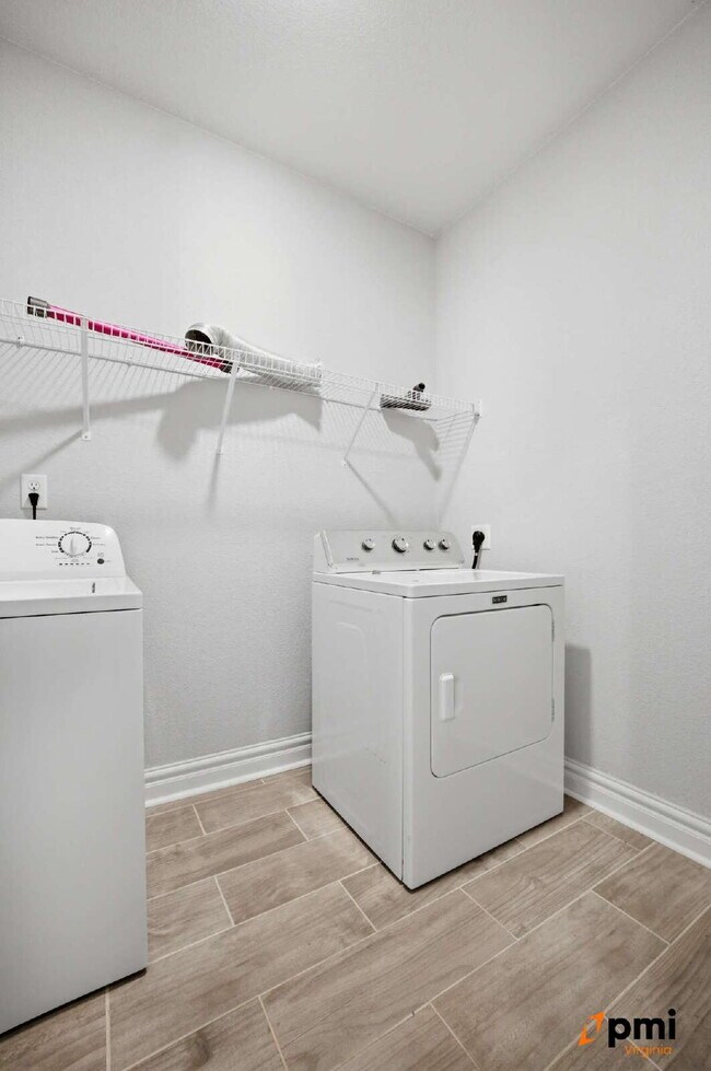 Building Photo - Stunning 5 Bedroom Waterfront Home with 2 car garage