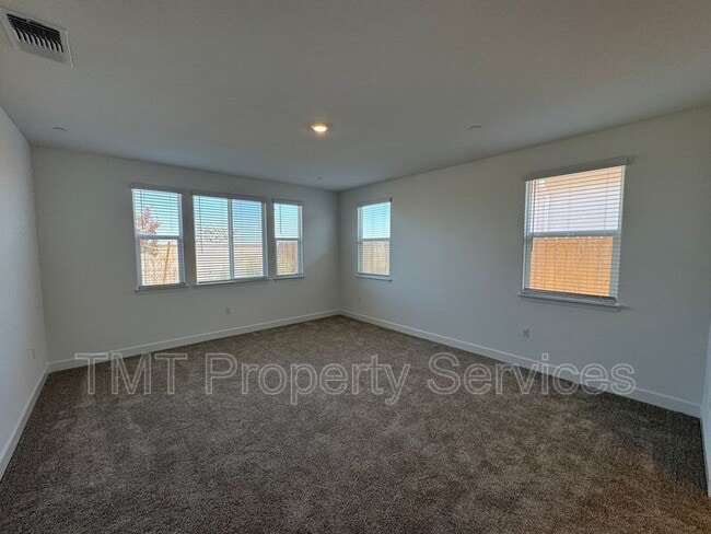 Building Photo - 5210 Peace Lily Ln