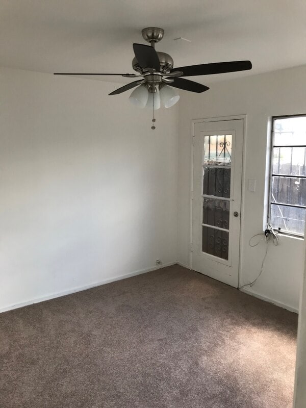 Bedroom 1 with Rear Door to Patio - 7857 Crenshaw Blvd