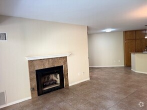 Building Photo - Spacious 2-Bedroom Condo with Rare 2-Car G...