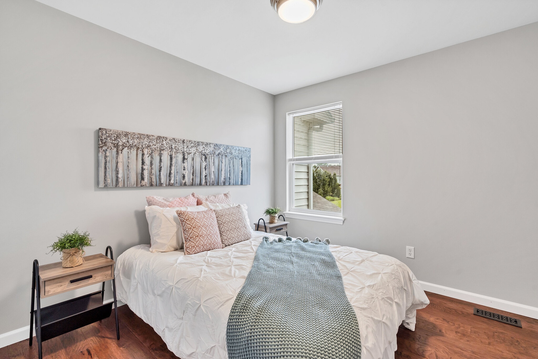 Second bedroom with hardwood and custom organizers in the closet - 201 Countryshire Dr