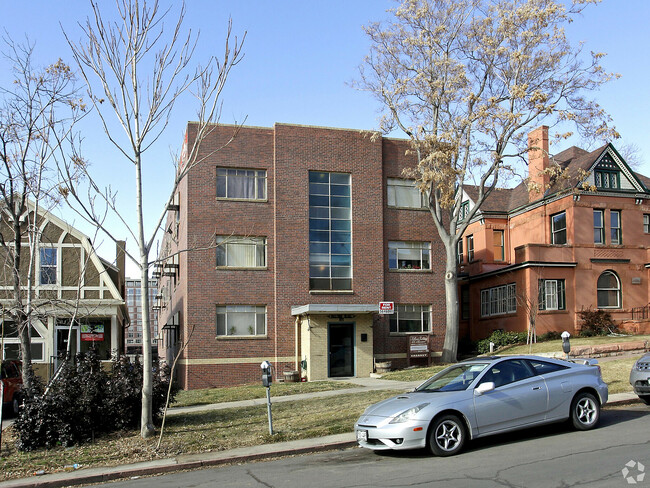 Explore the charm and convenience of urban living in this classic apartment building. - Hillside Apartments