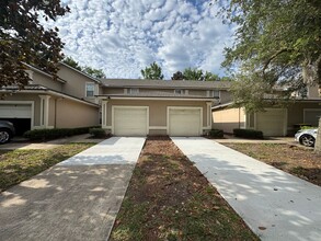 Building Photo - Available Now! Westside Timothy's Landing 2/2.5 Townhome with a 1-Car Garage
