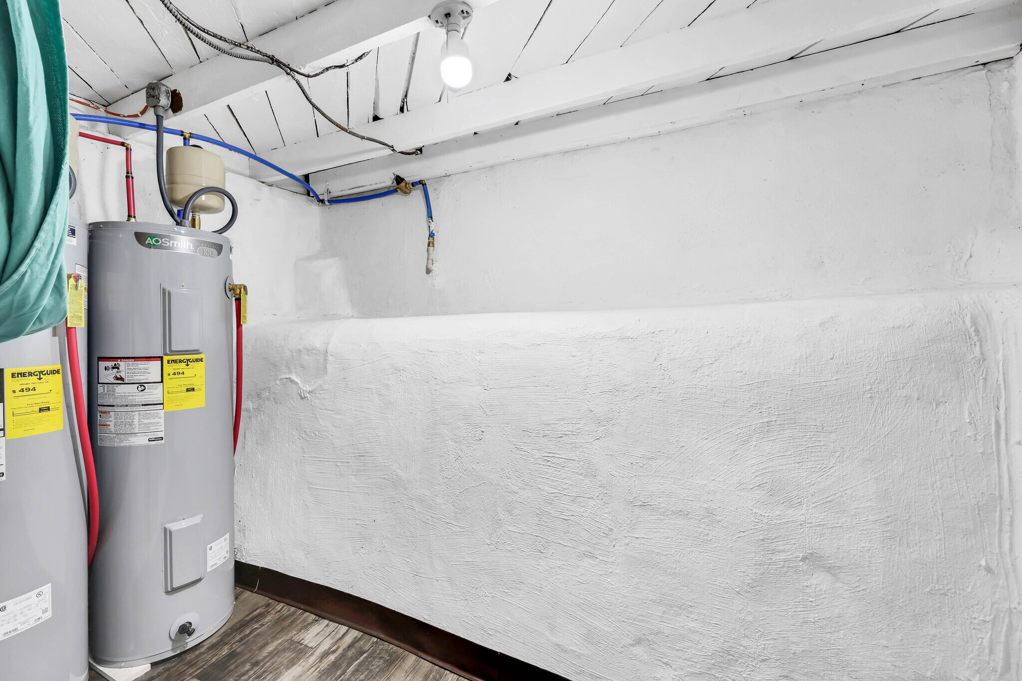 Storage closet with brand new hot water heaters. - 1 Proctor Dr