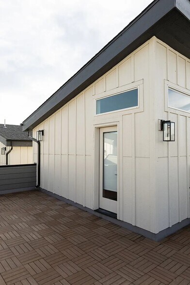 Private rooftop with a view of downtown, DU, mountains, and surrounding areas - 3505 S Marion St