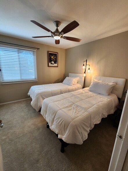 2nd bedboom has twin adjusting beds. Push together if improves comfort. - 5050 N 81st St