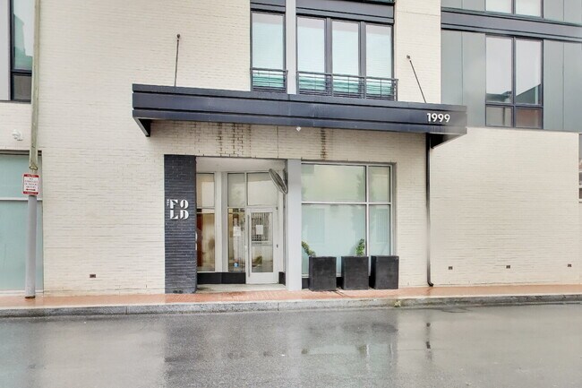 Building Photo - Top floor residence in elevator building with sweeping views.