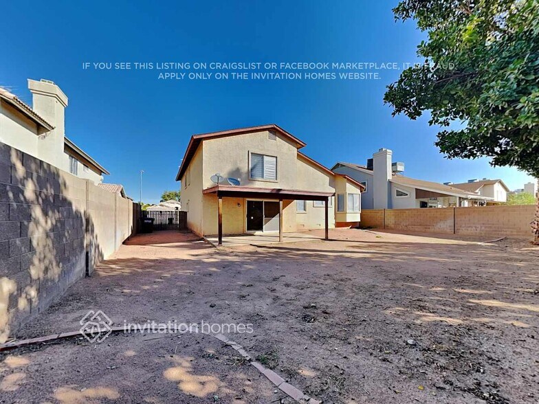 Building Photo - 8445 W Emile Zola Ave