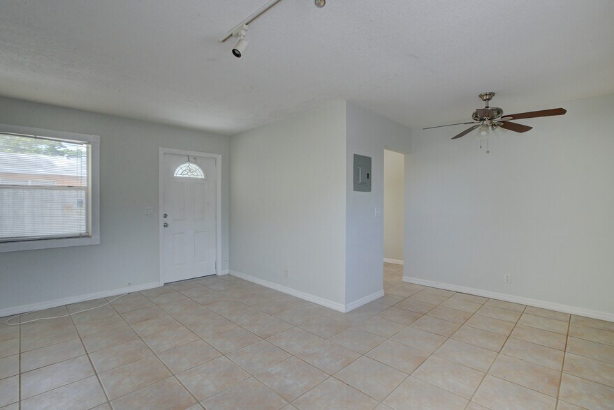 Living room. Front door - 604 NE 12th Ave