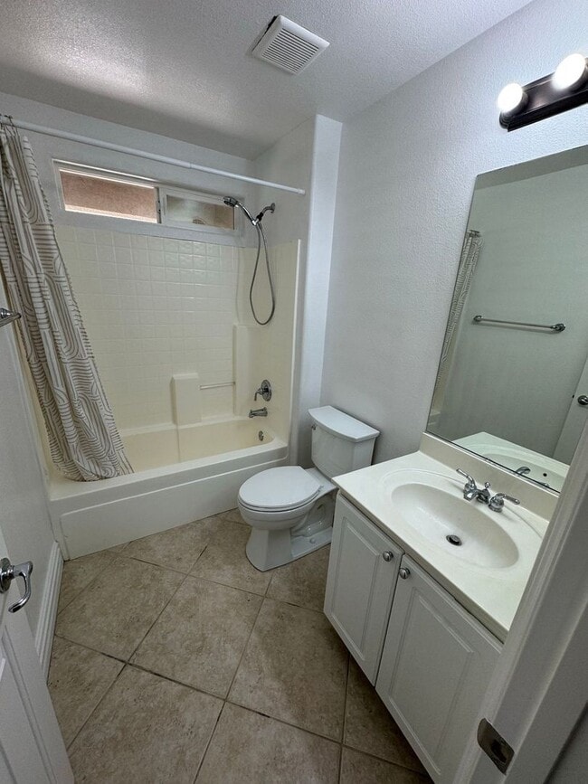 Building Photo - STUNNING 2 STORY HOME IN A GUARD GATED COM...