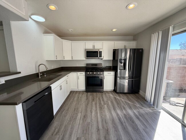Building Photo - $500 OFF 1ST MONTHS RENT Updated 3-Bedroom Townhome in Gated Community with Pool Access