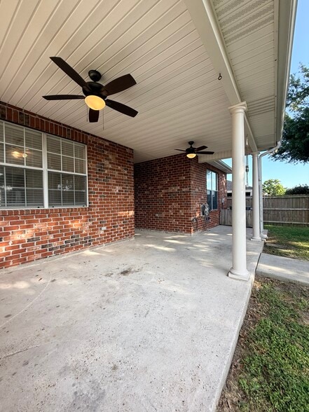 covered patio with ceiling fans - 3245 Iowa Ave