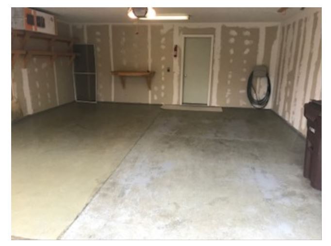 2-CAR GARAGE WITH STORAGE SHELVES - 12824 43rd St NE