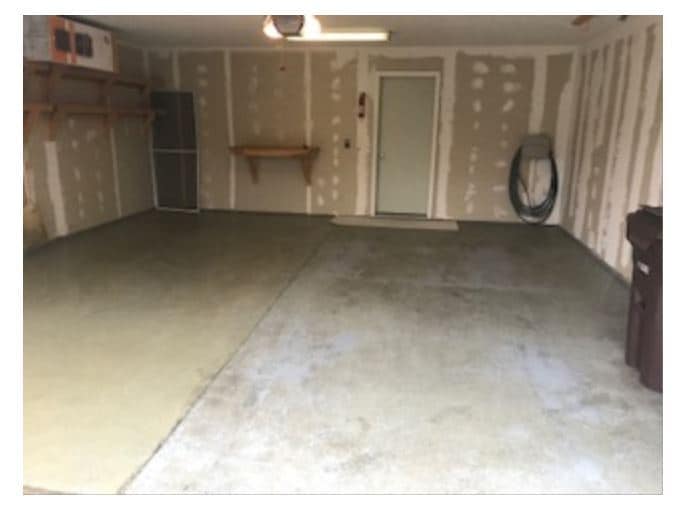 2-CAR GARAGE WITH STORAGE SHELVES - 12824 43rd St NE