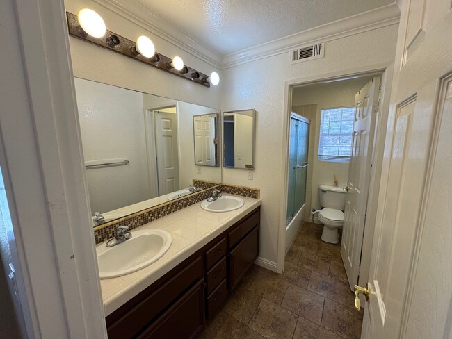 Building Photo - Gorgeous for 4 Bedroom and gated community