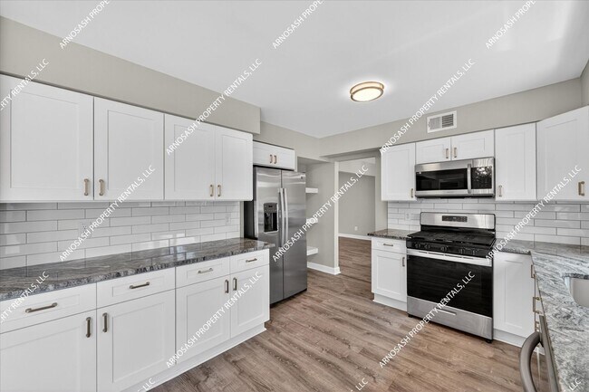Building Photo - Rare Rental Opportunity in Southfield — Fully Renovated 4-Bedroom Brick Colonial!