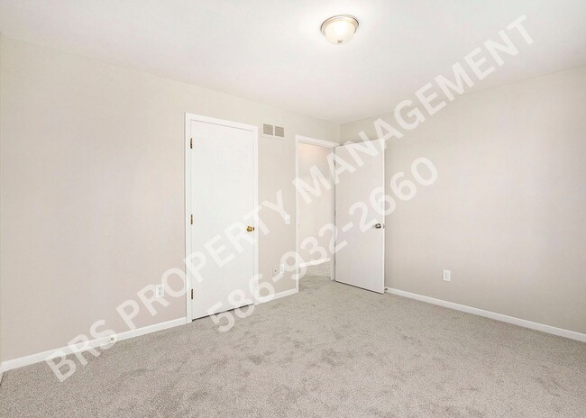 Building Photo - Charming 2-Bedroom Condo in Clinton Twp. –...