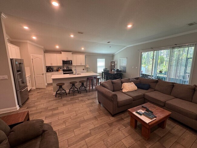 Building Photo - Spacious 4BR/3BA Home in Sawmill Branch at Palm Coast Park! Pool, Tennis & Fitness Center! Pet Fr...