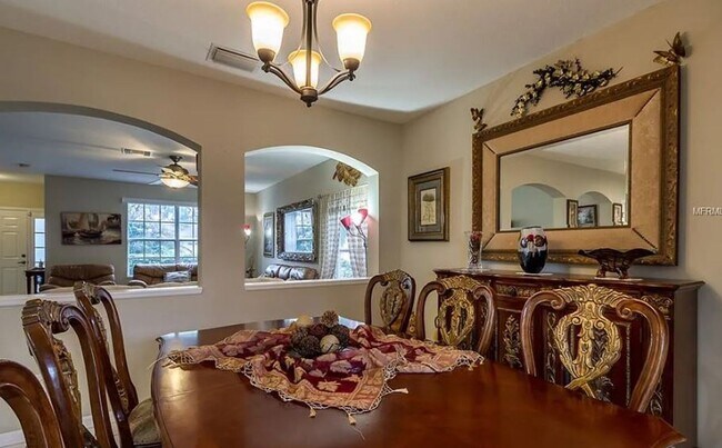 Building Photo - Charming 4-Bedroom Home with Pond Views & ...