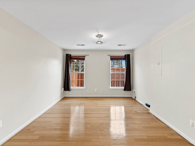 Building Photo - Sunlit Sanctuary Awaits: Spacious Townhous...