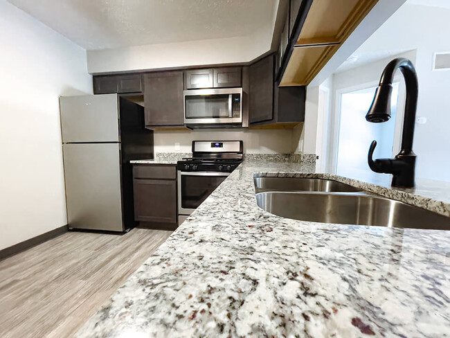 Granite countertops available in select apartments! - Huntington Glen