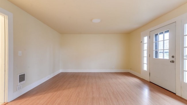 Building Photo - Charming 2 Bedroom 1 Bathroom Bungalow with Oversized 1 Car Garage and Large Manicured  Backyard ...