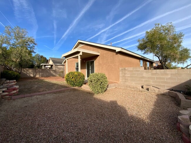 Building Photo - 4 Bedroom Single Story Home Available Near Paseo Del Norte Blvd NE & Universe Blvd NW!