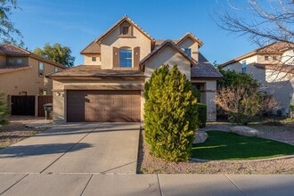 Building Photo - For Lease Beautifully Updated 4-bedroom, 2.5-Bathroom +Den, 1st Floor Office Gem, With a 2-car At...