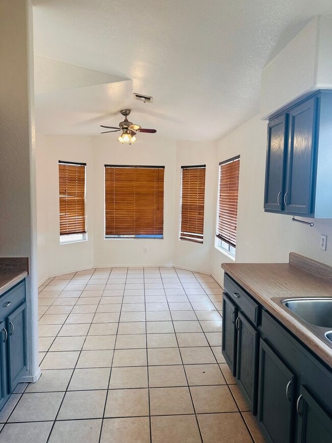 Building Photo - WEST SIDE HOME - SILVERBELL AREA - 2 BEDROOM PLUS LARGE DEN - LARGE YARD