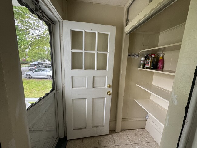 Back entrance mud room lead to backyard parking area - 21 Royall St