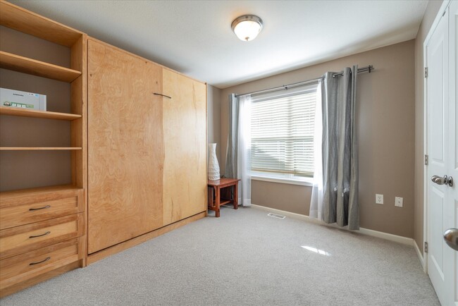 Middle Bedroom, can be an office, desk and chair in the closet - 11297 Wolverine Cir