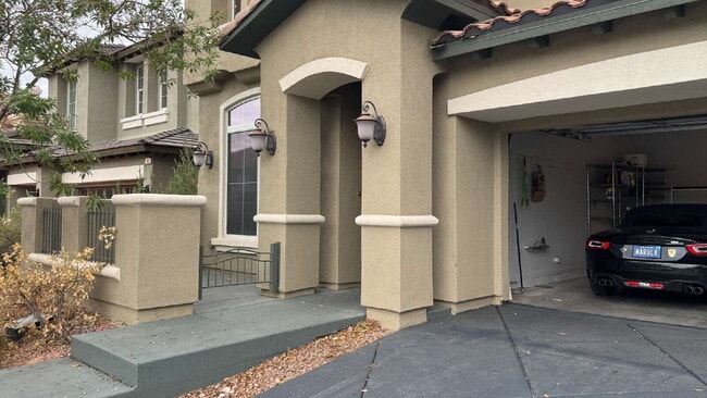 Building Photo - "Spacious 4-Bedroom Oasis with Granite Touches and Cozy Fireplace in Las Vegas!"