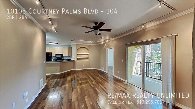 Building Photo - 10105 Courtney Palms Blvd