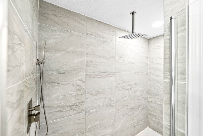 Building Photo - A Waterfall Shower, a Sunroom, and a Story Worth Coming Home To