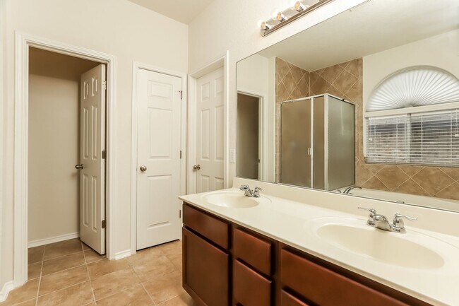 Building Photo - Spacious & Sun-Filled 4BR Retreat with Open-Concept Living and Versatile Dual Living Areas